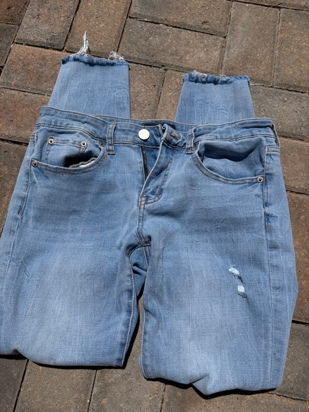 Women's Light Blue Distressed High-Rise Cropped Jeans